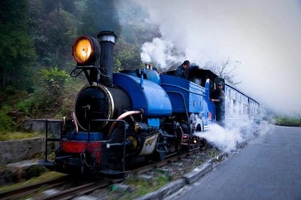 The Darjeeling toy train winding through the hills